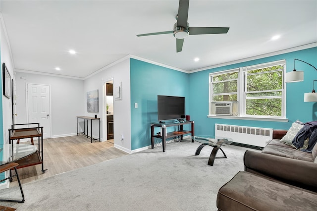 10 Bryant Cres Unit 1J, White Plains, NY 10605 - living area featuring radiator heating unit, cooling unit, ceiling fan, recessed lighting, and ornamental molding