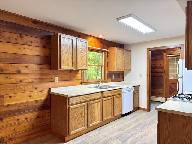 5 Will Palmer Rd, Catskill, NY 12414 - kitchen with white appliances, light wood finished floors, light countertops, a baseboard heating unit, and wood walls