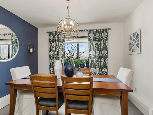 666 Pelham Rd Unit 3N, New Rochelle, NY 10805 - dining room featuring a chandelier and baseboards