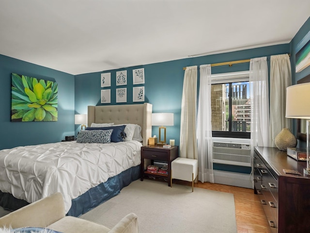 666 Pelham Rd Unit 3N, New Rochelle, NY 10805 - bedroom with cooling unit and light wood-type flooring