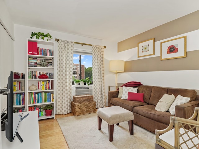 666 Pelham Rd Unit 3N, New Rochelle, NY 10805 - living area featuring wood finished floors and a wall mounted AC