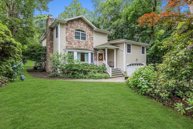 9 Endicott Dr, Huntington, NY 11743 - traditional-style home with stone siding, a chimney, a garage, and a front lawn