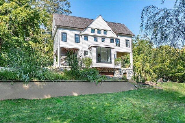 11 Lawrence Ln, Palisades, NY 10964 - view of front of home featuring a front lawn, stone siding, and roof with shingles
