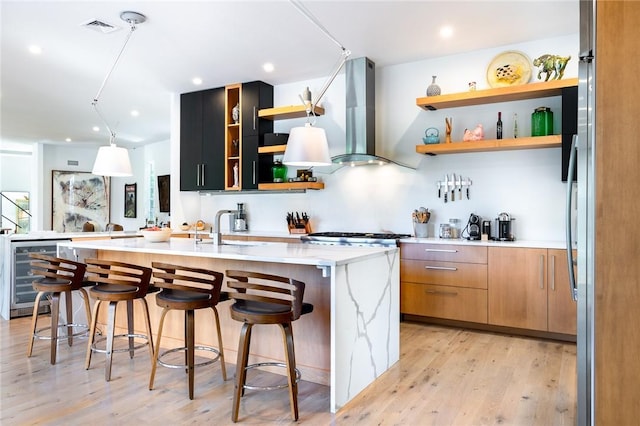 11 Lawrence Ln, Palisades, NY 10964 - kitchen with beverage cooler, open shelves, extractor fan, light wood-type flooring, and recessed lighting
