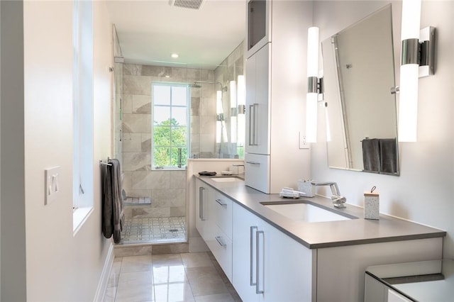 11 Lawrence Ln, Palisades, NY 10964 - bathroom featuring double vanity, a stall shower, tile patterned floors, and recessed lighting