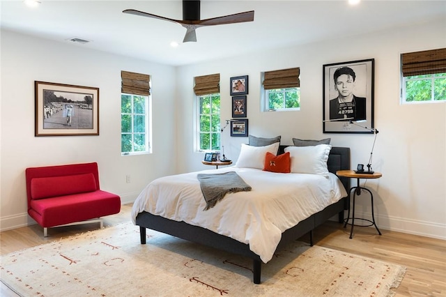 11 Lawrence Ln, Palisades, NY 10964 - bedroom featuring multiple windows, wood finished floors, recessed lighting, and ceiling fan