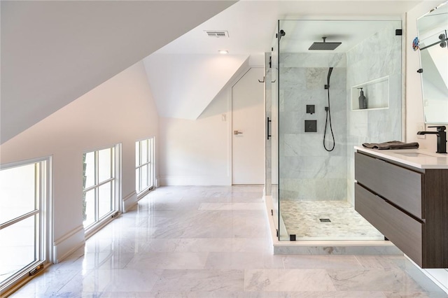11 Lawrence Ln, Palisades, NY 10964 - bathroom with marble look tiles, a marble finish shower, vanity, and vaulted ceiling