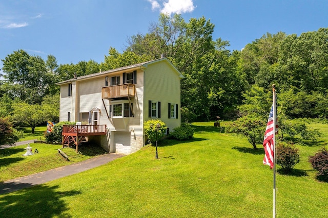 TR34 10 Hoffman Rd, Fremont Center, NY 12736 - view of front of home featuring a balcony, an attached garage, a front lawn, and driveway