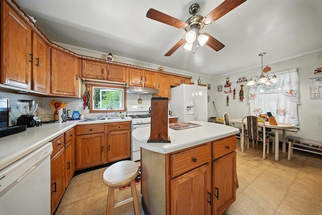 TR34 10 Hoffman Rd, Fremont Center, NY 12736 - kitchen with white appliances, under cabinet range hood, brown cabinets, a ceiling fan, and crown molding