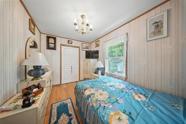 TR34 10 Hoffman Rd, Fremont Center, NY 12736 - bedroom featuring ornamental molding, light wood-style flooring, and a chandelier