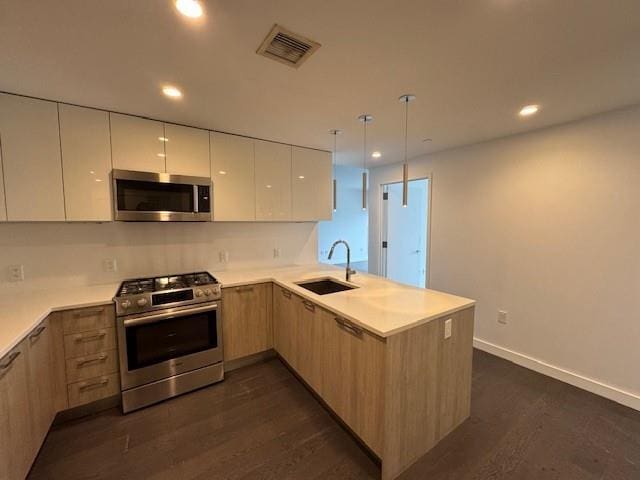 13105 40th Rd Unit 15E, Flushing, NY 11354 - kitchen with stainless steel appliances, modern cabinets, a peninsula, recessed lighting, and dark wood-type flooring
