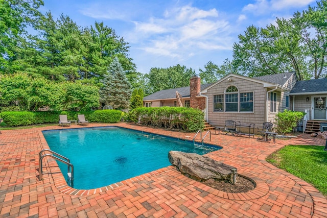 14 Etna Ln, Dix Hills, NY 11746 - swimming pool with a patio area
