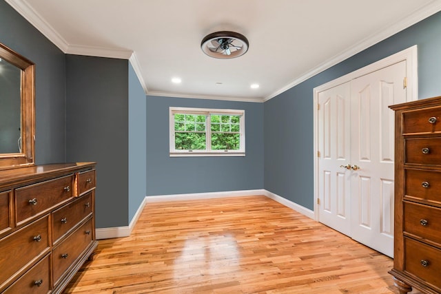 14 Etna Ln, Dix Hills, NY 11746 - unfurnished bedroom featuring light wood finished floors, ornamental molding, a closet, and recessed lighting