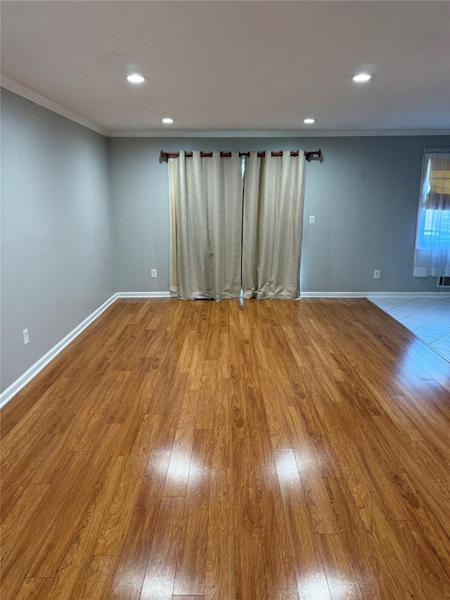 40 New Holland Vlg, Nanuet, NY 10954 - spare room with crown molding, wood-type flooring, and recessed lighting