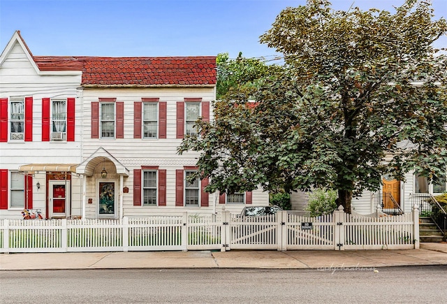 60-14 69th Pl, Maspeth, NY 11378 - multi unit property featuring a fenced front yard