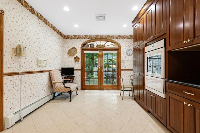 60-14 69th Pl, Maspeth, NY 11378 - living area featuring wallpapered walls, baseboard heating, recessed lighting, light tile patterned floors, and french doors