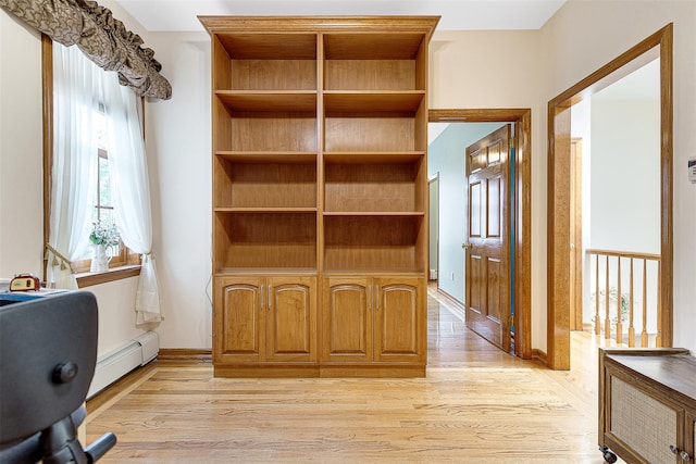 60-14 69th Pl, Maspeth, NY 11378 - closet featuring a baseboard heating unit