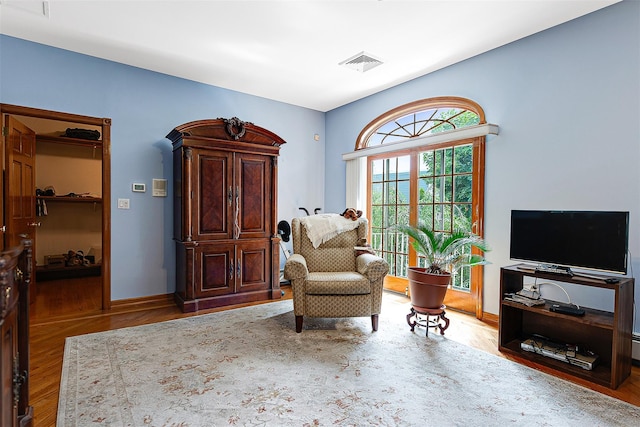 60-14 69th Pl, Maspeth, NY 11378 - living area with wood finished floors