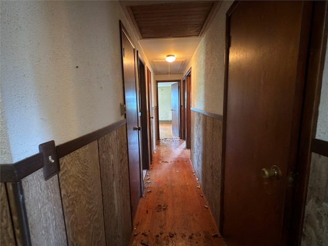 6 James Pl, Wappingers Falls, NY 12590 - hall featuring attic access, light wood-style flooring, and a wainscoted wall