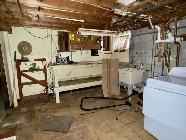 6 James Pl, Wappingers Falls, NY 12590 - basement featuring washer / clothes dryer and a workshop area