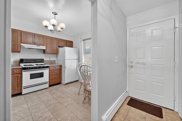 3 Adrian Ct Unit B, Cortlandt Manor, NY 10567 - kitchen featuring white appliances, under cabinet range hood, a baseboard radiator, a chandelier, and light tile patterned floors