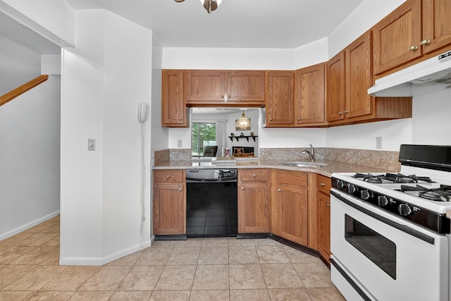3 Adrian Ct Unit B, Cortlandt Manor, NY 10567 - kitchen with gas range gas stove, dishwasher, under cabinet range hood, brown cabinetry, and light tile patterned floors