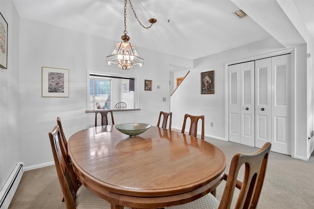 3 Adrian Ct Unit B, Cortlandt Manor, NY 10567 - dining area featuring baseboard heating, light carpet, and a chandelier