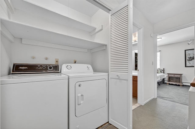 3 Adrian Ct Unit B, Cortlandt Manor, NY 10567 - laundry room featuring washer and dryer, light carpet, and baseboard heating