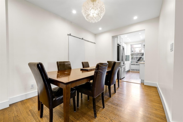 110-34 73rd Rd Unit 5A, Forest Hills, NY 11375 - dining area with a chandelier, light wood-style floors, recessed lighting, and radiator