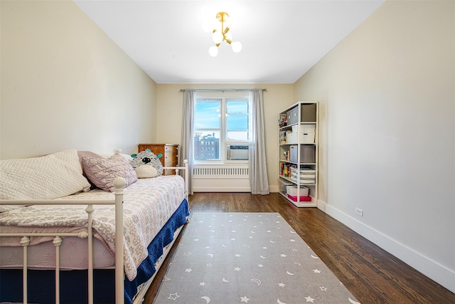 110-34 73rd Rd Unit 5A, Forest Hills, NY 11375 - bedroom with wood finished floors and a chandelier