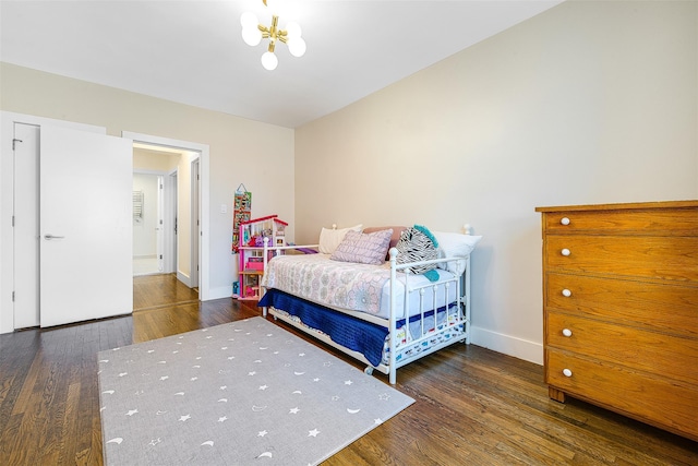 110-34 73rd Rd Unit 5A, Forest Hills, NY 11375 - bedroom featuring wood finished floors and a chandelier