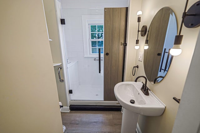 52 Mc Cue Ln, Babylon, NY 11702 - full bath with a shower stall and wood finished floors