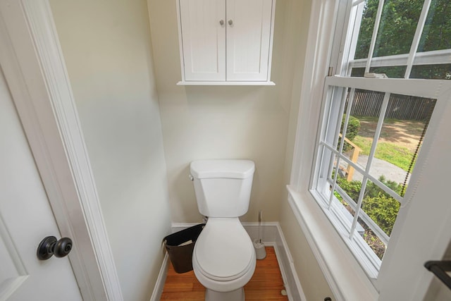 52 Mc Cue Ln, Babylon, NY 11702 - bathroom featuring toilet and wood finished floors