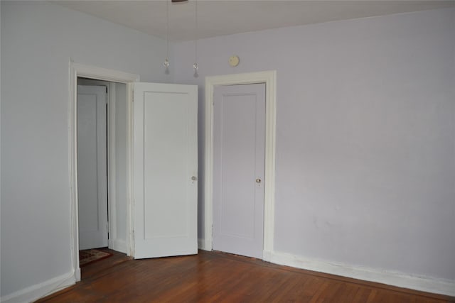 292 Main St Unit 4C, White Plains, NY 10601 - spare room with wood finished floors and a smoke detector