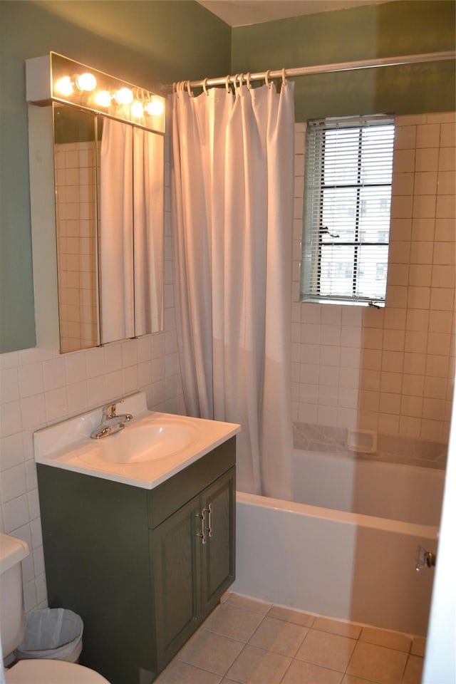 292 Main St Unit 4C, White Plains, NY 10601 - full bathroom featuring vanity, shower / tub combo, tile patterned floors, and tile walls