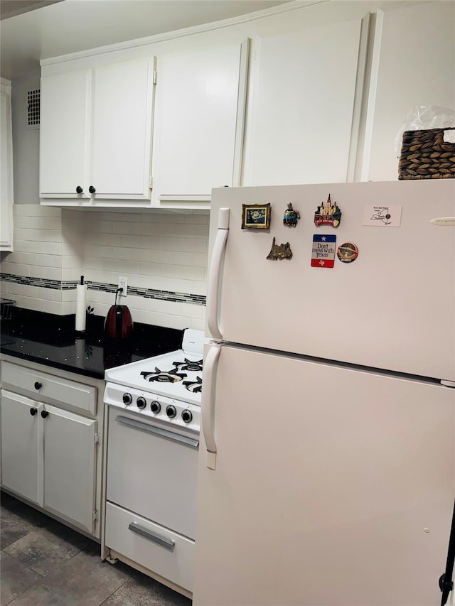 6515 Alderton St Unit 2A, Rego Park, NY 11374 - kitchen with white appliances, backsplash, white cabinetry, and dark countertops