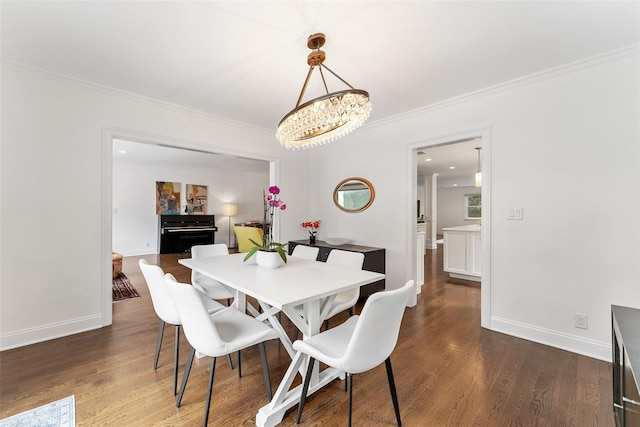 130 Carthage Rd, Scarsdale, NY 10583 - dining area with a chandelier, ornamental molding, and dark wood-style flooring