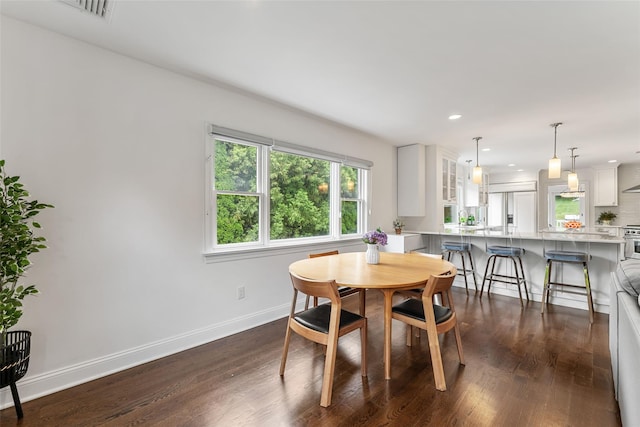 130 Carthage Rd, Scarsdale, NY 10583 - dining area featuring dark wood-type flooring and recessed lighting