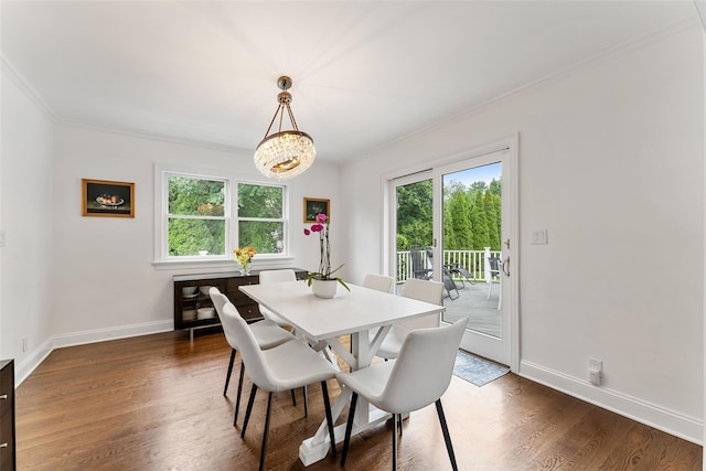 130 Carthage Rd, Scarsdale, NY 10583 - dining space featuring crown molding, plenty of natural light, dark wood finished floors, and a chandelier