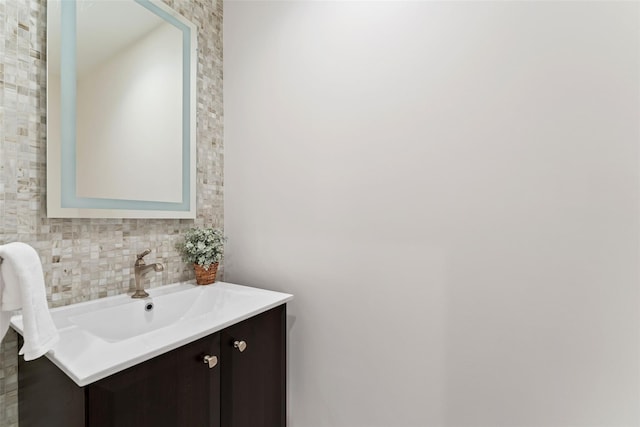 130 Carthage Rd, Scarsdale, NY 10583 - bathroom with vanity and tasteful backsplash