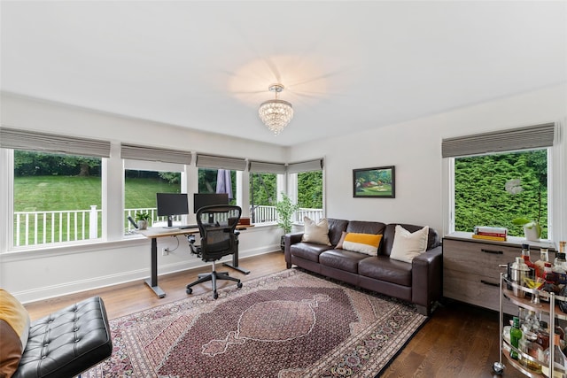 130 Carthage Rd, Scarsdale, NY 10583 - home office with dark wood-style floors and a chandelier