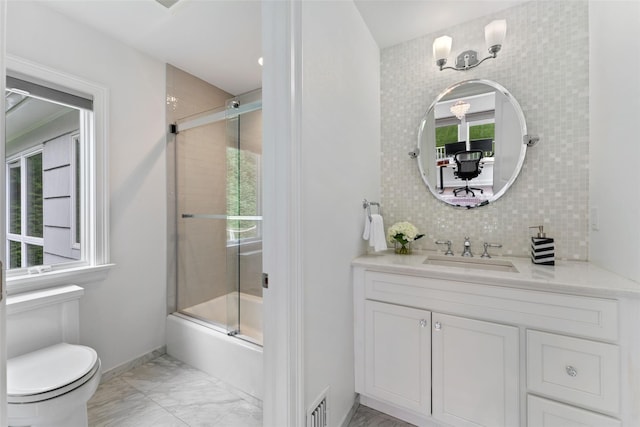 130 Carthage Rd, Scarsdale, NY 10583 - bathroom featuring marble finish flooring, vanity, enclosed tub / shower combo, and decorative backsplash