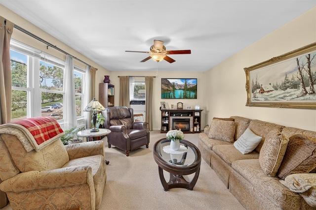135 S Highland Ave Unit B5, Ossining, NY 10562 - carpeted living room with a ceiling fan and a glass covered fireplace