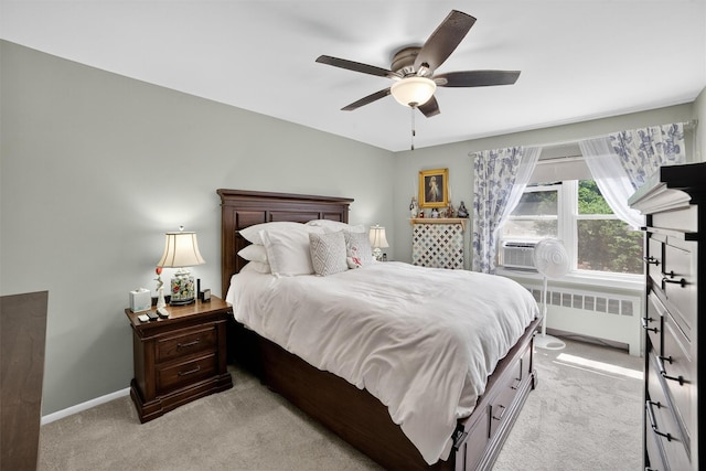 135 S Highland Ave Unit B5, Ossining, NY 10562 - bedroom with radiator, light carpet, and a ceiling fan