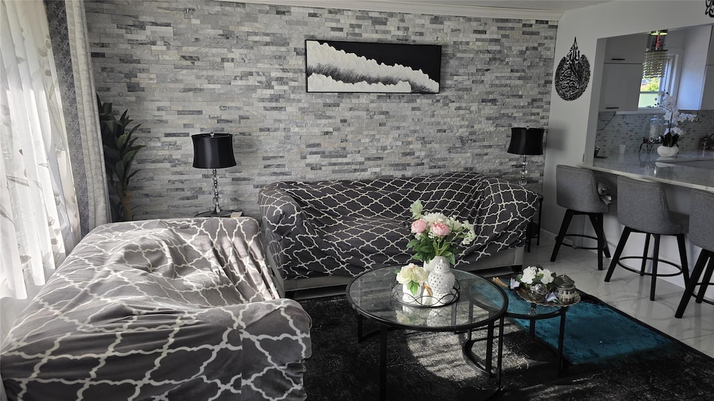 311 Travis Ave, Elmont, NY 11003 - living room featuring marble finish flooring