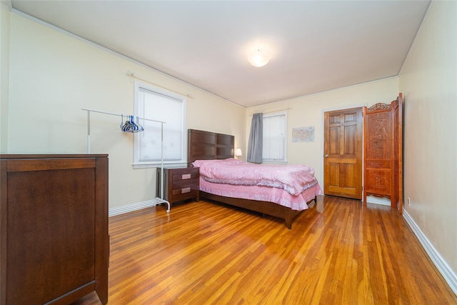 58-44 219th St, Bayside, NY 11364 - bedroom with light wood-style floors