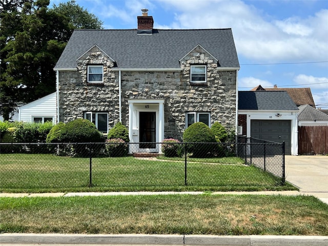 65 Surrey Ln, Hempstead, NY 11550 - view of front of house featuring stone siding, driveway, a chimney, a garage, and a shingled roof