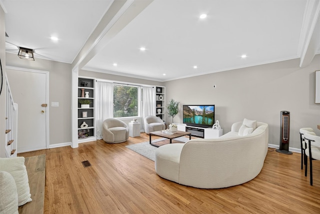 130 Cresthill Rd, Yonkers, NY 10710 - living area with light wood-style flooring, crown molding, and recessed lighting
