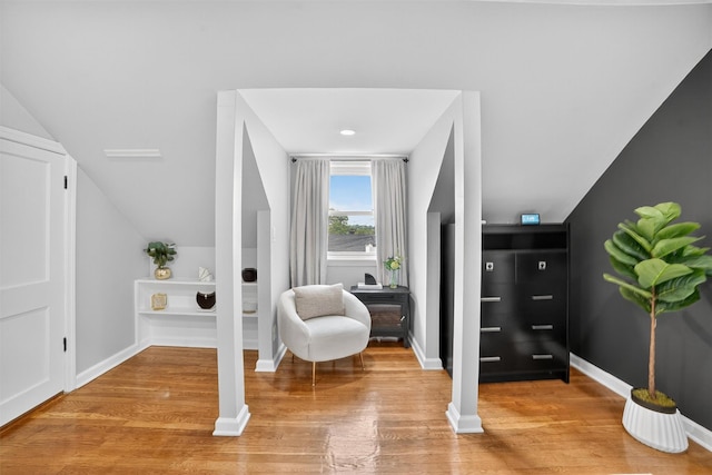 130 Cresthill Rd, Yonkers, NY 10710 - living area with light wood-style flooring and lofted ceiling