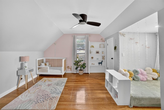 130 Cresthill Rd, Yonkers, NY 10710 - bedroom with vaulted ceiling, wood finished floors, and a ceiling fan